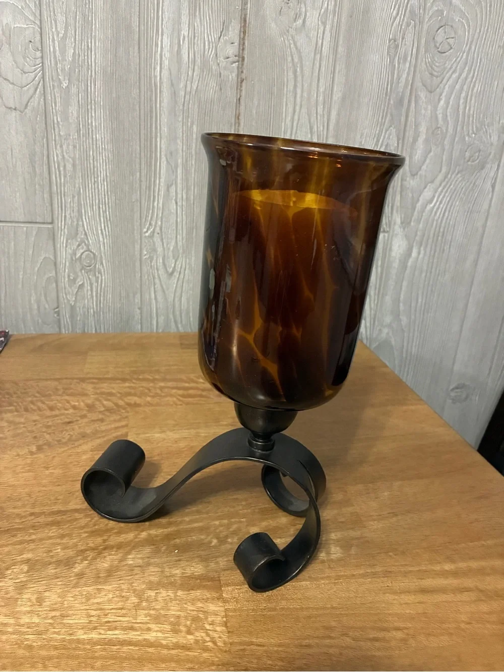 Amber Glass Hurricane Candle Holder with Black Scroll Base 11” x7”